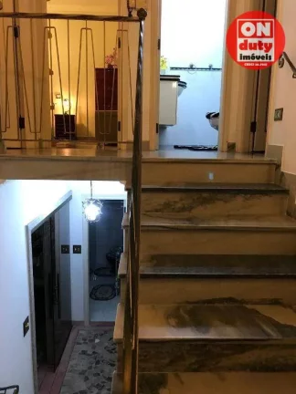 Imagem Sobrado à venda, 200 m² por R$ 1.950.000 - Ponta da Praia - Santos/SP