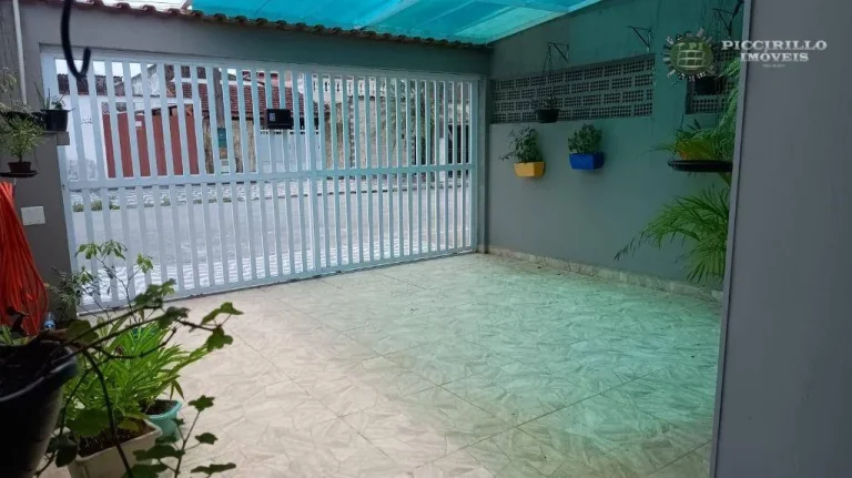 Imagem Casa com 2 dormitórios à venda, 63 m² por R$ 380.000,00 - Mirim - Praia Grande/SP