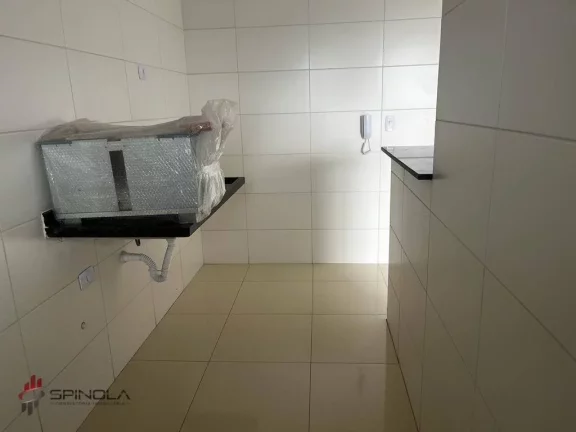 Imagem Apartamento com 2 dormitórios à venda, 67 m² por R$ 410.000,00 - Maracanã - Praia Grande/SP