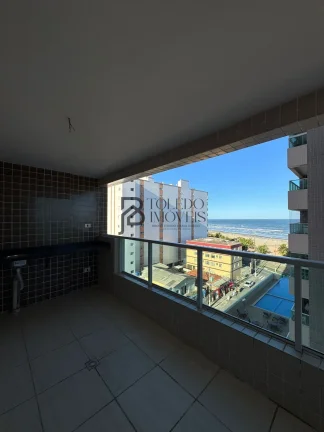 Imagem Apartamento de 2 dormitórios sendo 1 suíte, prédio frente mar no bairro Vila Mirim - Praia Grande