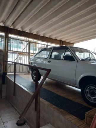Imagem Casa Antiga com 250 metros e uma Edicila Exlente para Costrutor
