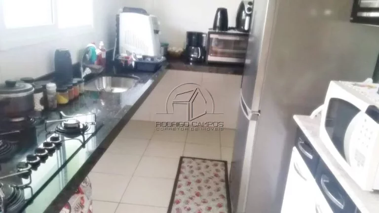 Imagem Casa Geminada à Venda em Tude Bastos, Praia Grande - 2 Quartos e Churrasqueira