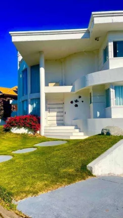 Imagem Casa à Venda, 485m2, 6 Suítes, 4 vagas, Cond. Fechado, Porto da Lagoa, Florianópolis/SC