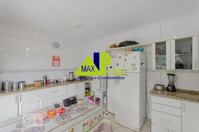 Imagem Ampla casa à venda em São Paulo-SP: 5 quartos, 1 suíte, 3 salas, 2 vagas, 210m² na Vila Buenos Aires!