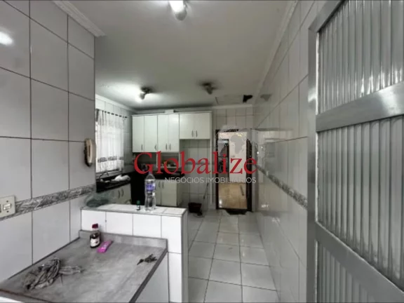 Imagem Casa à venda com 275m², 4 quartos, 4 vagas, piscina, churrasqueira por R$ 609.000,00 no Bom Retiro - Santos
