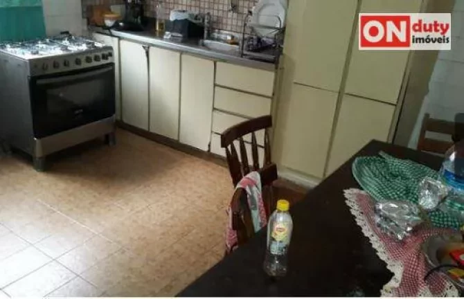 Imagem Sobrado à venda, 114 m² por R$ 690.000,00 - Ponta da Praia - Santos/SP