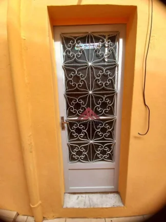 Imagem Otima casa no centro de São Gonçalo com varanda,Sala 02 quartos bamheiro,cozinha e area de serviço,vaga de garagem,proximo a todo comércio do centro d