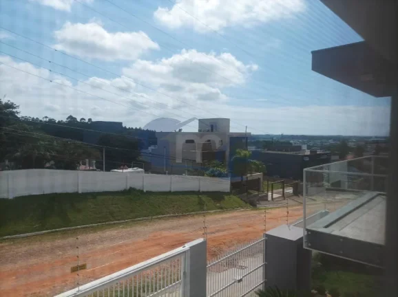 Imagem Casa de alto padrão á venda com 4 suites no bairro Centenário em Torres/RS
