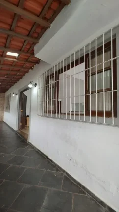 Imagem Casa para Venda em Praia Grande, Caiçara, 2 dormitórios, 1 suíte, 2 banheiros, 4 vagas