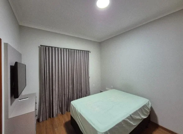Imagem Imperdível oportunidade de adquirir casa de luxo em Votorantim-SP, no Alphaville Nova Esplanada 3, com 4 quartos, 3 suítes, 4 vagas de garagem e 204,10 m² de área.