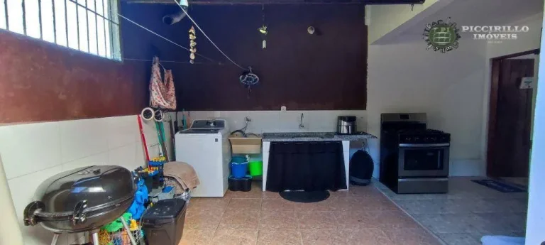 Imagem Sobrado com 3 dormitórios à venda, 118 m² por R$ 680.000,00 - Canto do Forte - Praia Grande/SP