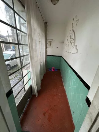 Imagem Sobrado com 2 dormitórios à venda, 98 m² por R$ 393.000 - Macuco - Santos/SP