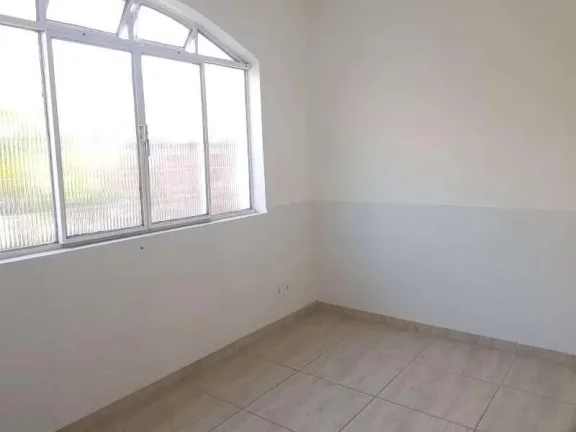 Imagem Confortável Apartamento de Três Quartos com Suíte e Garagem para Um Carro