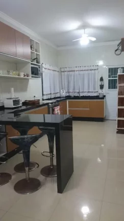 Imagem Sobrado à venda, 320 m² por R$ 1.200.000,00 - Maracanã - Praia Grande/SP