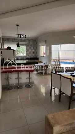 Imagem Lindo sobrado com 3 suites, sendo uma Master, escritório, piscina aquecida, área Gourmet, living c...