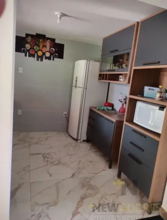 Imagem Casa ampla em 360m²: 2 pavimentos, 3 quartos, suíte, churrasqueira e fogão a lenha.