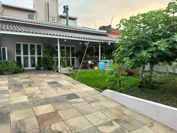 Imagem Casa de condomínio à venda em Porto Alegre, Petrópolis, com 3 quartos, 165m2
