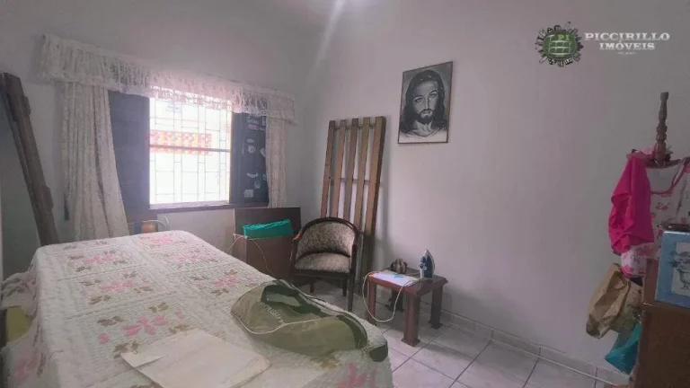 Imagem Casa com 3 dormitórios à venda, 240 m² por R$ 700.000,00 - Caiçara - Praia Grande/SP