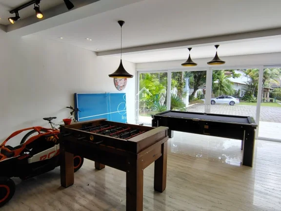 Imagem Casa de luxo em condomínio na Enseada, Guarujá-SP: 5 quartos, 5 suítes, 2 salas, 4 vagas e 390m² de área. Imperdível!