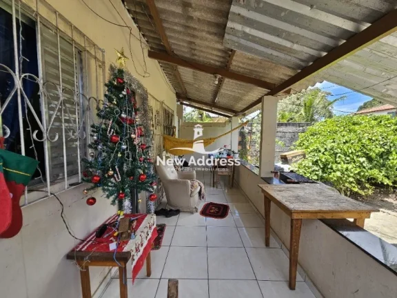 Imagem Casa 2 quartos à venda em Enseada de Jacaraípe, murada e gradeada, ideal para quem busca praticidade e quintal.