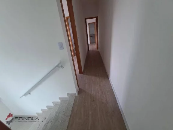 Imagem Sobrado com 3 dormitórios à venda, 104 m² por R$ 635.000,00 - Tude Bastos - Praia Grande/SP