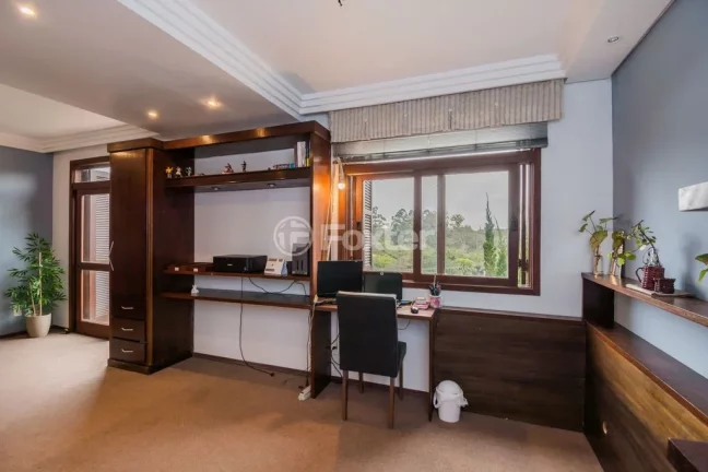 Imagem Casa em Condomínio 3 dorms à venda Avenida Vicente Monteggia, Cavalhada - Porto Alegre
