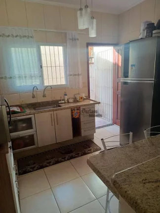 Imagem Sobrado com 2 dormitórios à venda, 79 m² por R$ 318.000 - Oceanópolis - Mongaguá/SP
