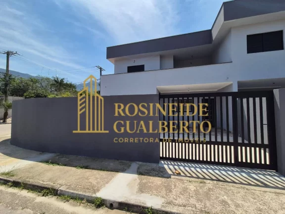Belíssimo Sobrado novo 3 dormitórios suítes na praia de Massaguaçu.