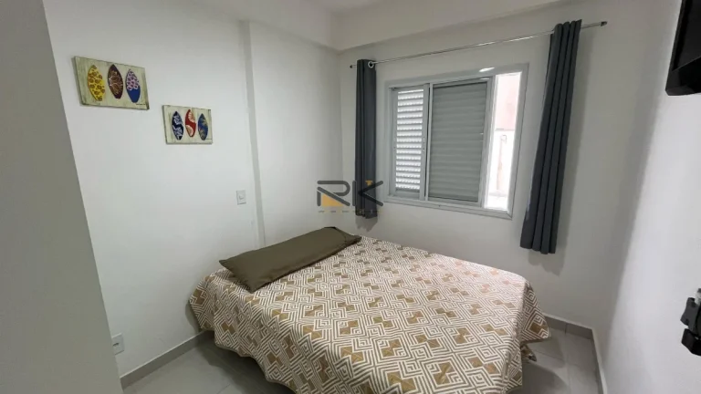 Imagem APARTAMENTO PRAIA GRANDE com 2 dormitórios sendo 1 suíte,1 vaga de garagem,varanda gourmet com churrasqueira,sala 2 ambientes