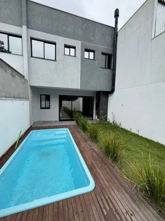 Imagem Sobrado com 3 suítes e 2 vagas com piscina no São Francisco de Assis, Camboriú/SC