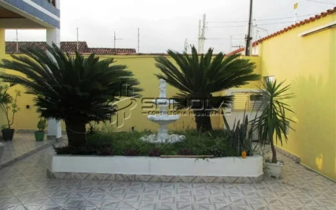 Imagem Casa com 3 dormitórios à venda, 190 m² por R$ 850.000 - Vila Tupi - Praia Grande/SP