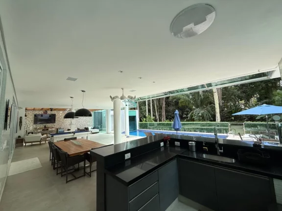 Imagem Incrível mansão à venda em Riviera de São Lourenço Módulo 21: 6 quartos, 6 suítes, 3 salas, 705m². Venha conferir!