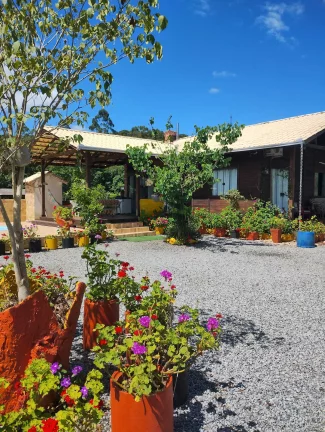 Imagem Sitio com casa e piscina no Braço em Camboriú