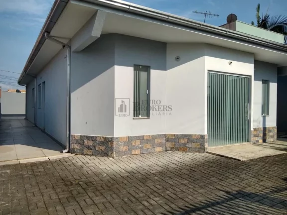 Imagem Casa com 3 dormitórios à venda em condomínio fechado em Camboriú/SC