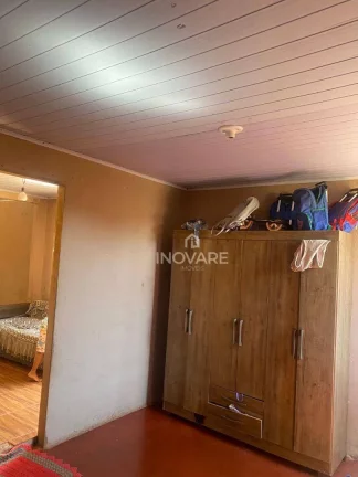 Imagem Casa com 2 dormitórios à venda, 70 m² por R$ 120.000 - Conjunto Habitacional Dona Norma Gibaldi - Itumbiara/GO