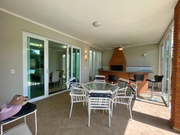 Imagem Casa à venda na Riviera de São Lourenço Módulo 03: 4 quartos, 4 suítes, 3 salas, 8 vagas de garagem e 329,74 m² de área.