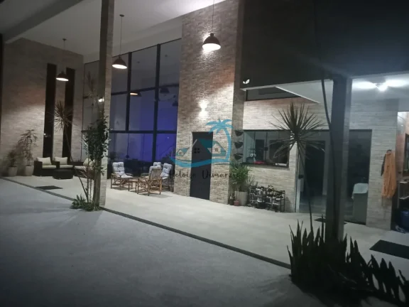 Imagem Casa de alto padrão a venda com 4 dormitórios, 360m² de área construída - Jardim Carolina em Ubatuba.