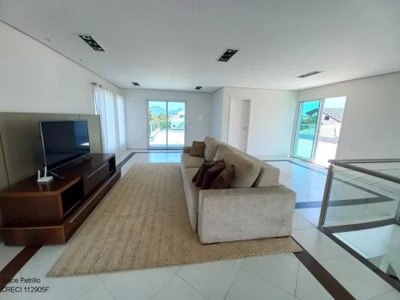 Imagem Casa Moderna com 4 Suítes, Piscina, Pertinho da Praia em Condomínio Fechado de Alto Padrão à Venda em Peruíbe.