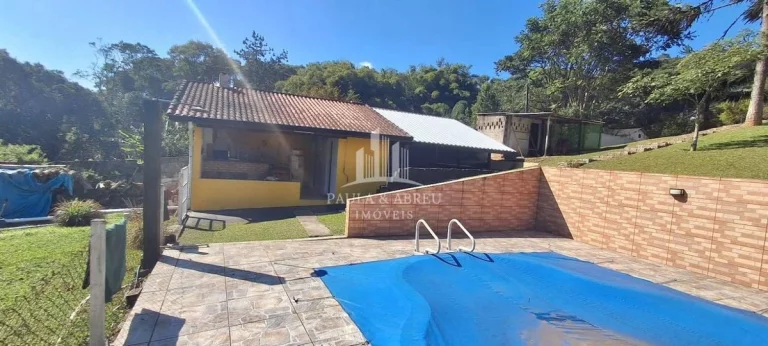 Imagem Chácara com 4 Quartos, 2 Banheiros, Área para Churrasco Grande, Piscina, Lago com Peixes, Estacionamento para 25 carros, Córrego nos fundos, espaço para fazer campo, no Rio Grande da Serra-SP