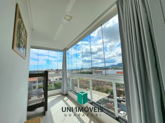 Imagem Amplo apto 2 quartos/suíte, à Venda na Praia do Morro - Prédio com elevador e vista montanhas !