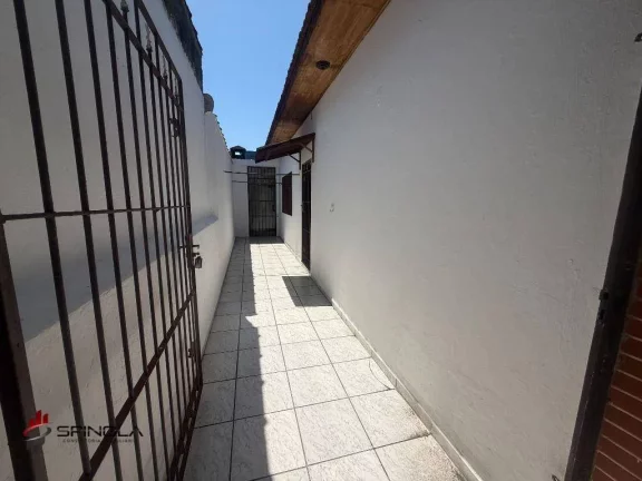 Imagem Casa com 2 dormitórios à venda, 80 m² por R$ 370.000,00 - Maracanã - Praia Grande/SP