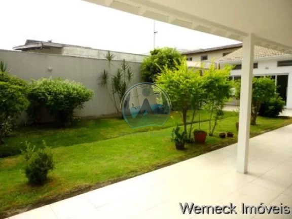 Imagem Imperdível Casa à Venda em Ubatuba-SP - 4 quartos, 4 suítes, 6 banheiros, 4 vagas de garagem - Bairro Itaguá - 540m² de área
