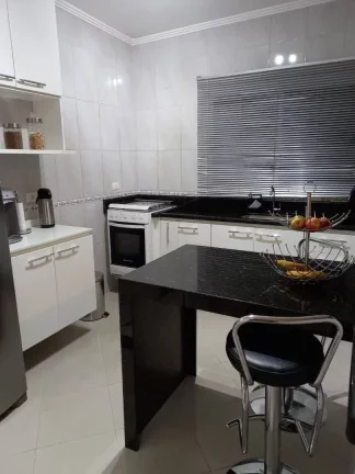 Imagem Sobrado com 2 dormitórios à venda, 107 m² por R$ 580.000,00 - Vila Cecília Maria - Santo André/SP