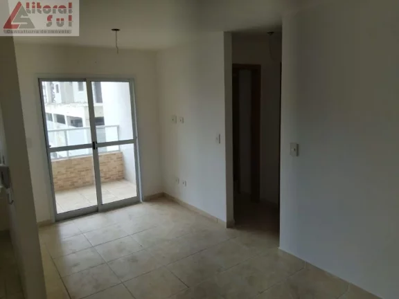 Imagem Apartamento à venda na Guilhermina, Praia Grande-SP: 2 quartos, 1 suíte, 1 vaga de garagem e 56m² de área. Adquira já!
