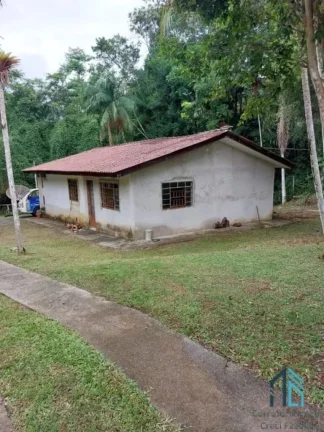 Imagem Chácara contendo tanque de peixes, 02 casas, internet, em condomínio - Morretes PR