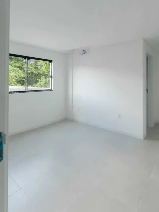 Imagem Apartamento com 2 dormitórios e 1 vaga de garagem em Navegantes/SC