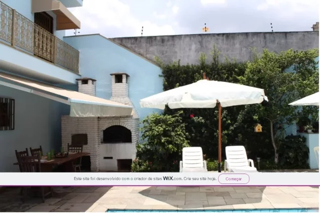 Imagem Casa de Luxo na Vila Ré: 3 Quartos, 3 Suítes, 5 Banheiros, 4 Vagas de Garagem e 426m² de Área em São Paulo-SP.