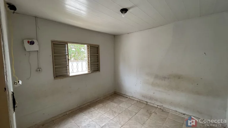Imagem Terreno de esquina com casa antiga à venda no Bairro São Francisco — Excelente localização em Patos de Minas