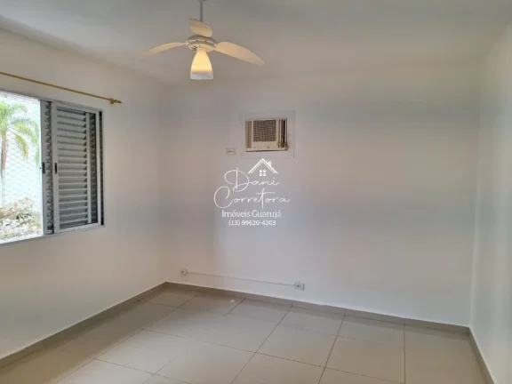 Imagem Imperdível oportunidade, apartamento de 2 quartos sem mobília na rua mais desejada do Guarujá-SP - 65m² - 1 vaga de garagem