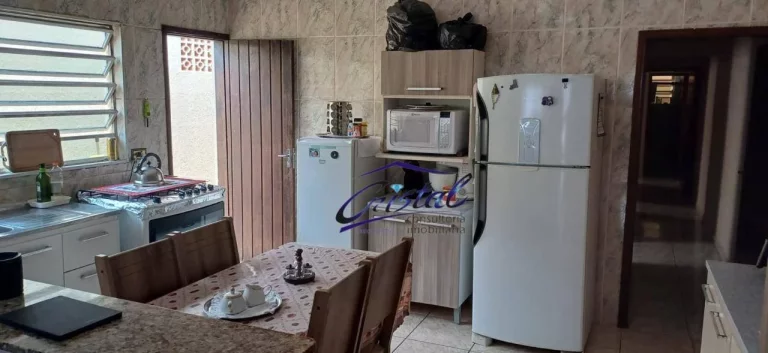 Imagem Casa com 3 dormitórios à venda, 114 m² por R$ 495.000 - Maracanã - Praia Grande/SP